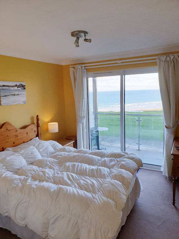 Main Bedroom - 3 Waters Edge - Holiday Apartment with Sea Views across Fistral Beach