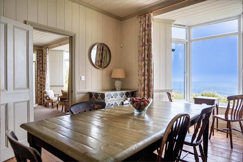 Dining area with Atlantic sea views at Chy Barnett holiday cottage, Land's End