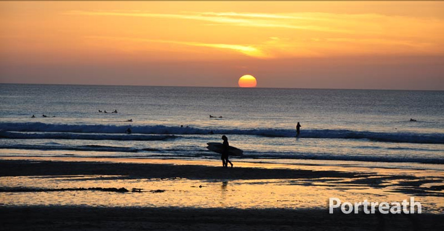 Surfing at Portreath Beach  