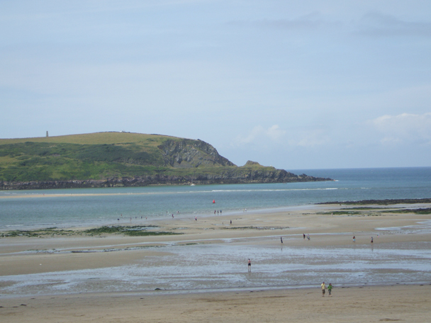 Low tide on the Camel estuary at Daymer Bay, with Stepper Point beyond