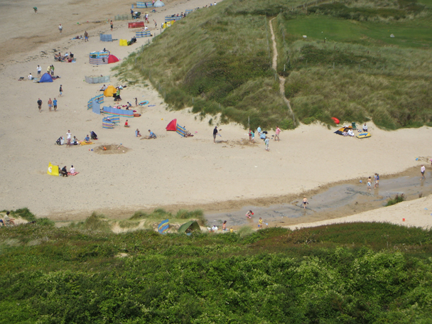 Families on the sand at Daymer Bay below the dunes