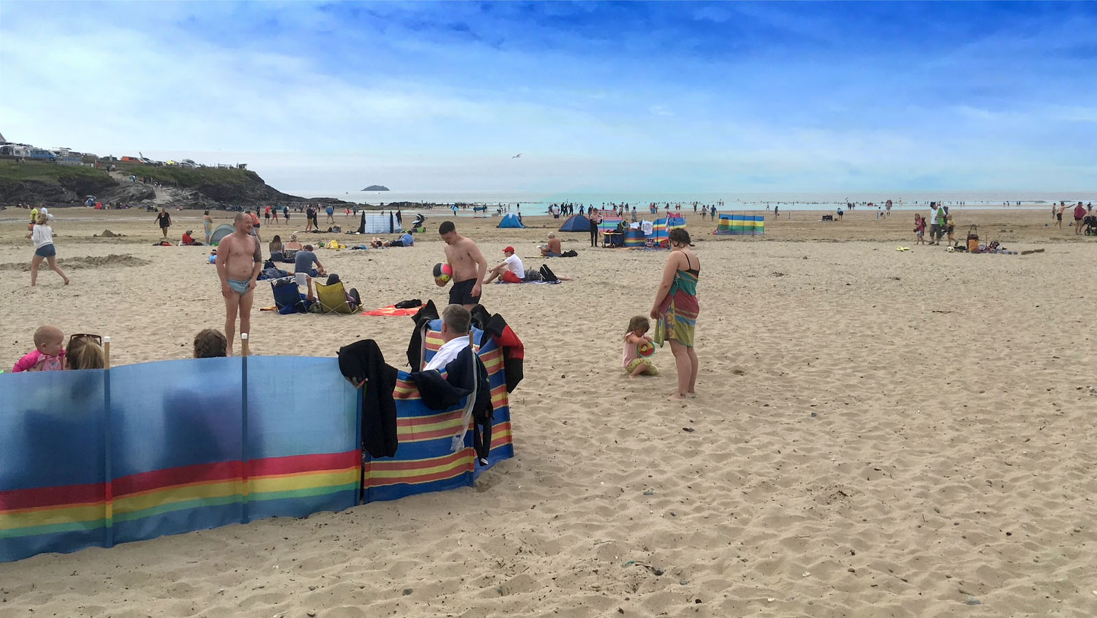 Families enjoying a day on Polzeath beach