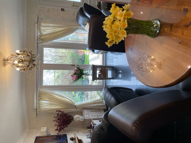 Dining area and lounge at hollyhocks bungalow at Olde Smithy Holidays Holidays in Welcombe North Devon