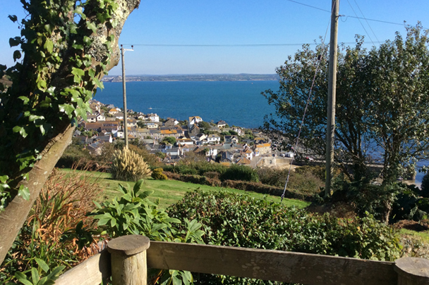 View from The Flowershed over Mousehole harbour and Mount's Bay, towards 