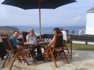 Relax on the patio and enjoy the views acroos the main surfing Beach towards Tintagel and Port Isaac