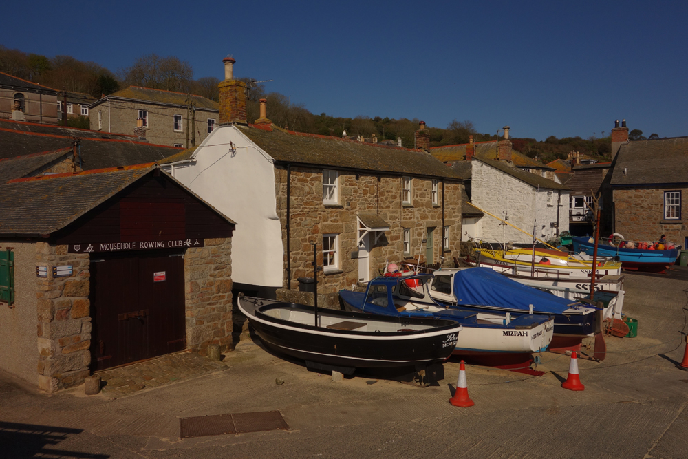 Granite fisherman’s cottage located on the south side of Mousehole harbour with Atlantic sea views