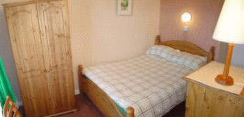 Bedroom at Sunset Self Catering