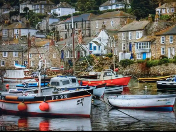 Boats in Mousehole Harbour near Trevean cottage 