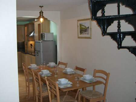 Kitchen-diner with spiral staircase