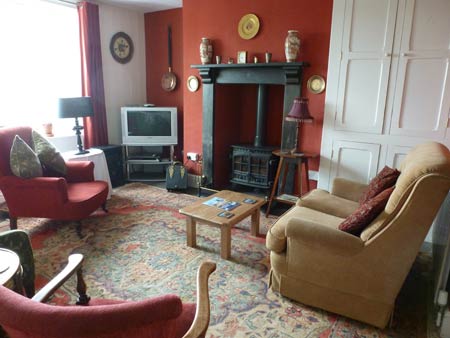 Sitting room with multi-fuel stove