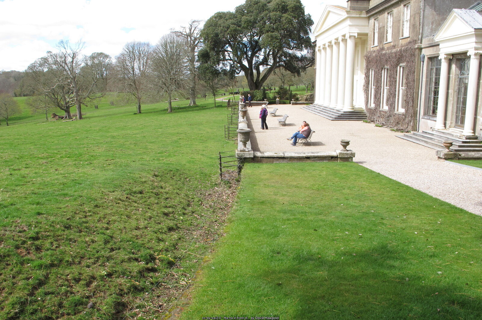 The ha-ha and lawn in front of Trelissick House, with the columned portico behind