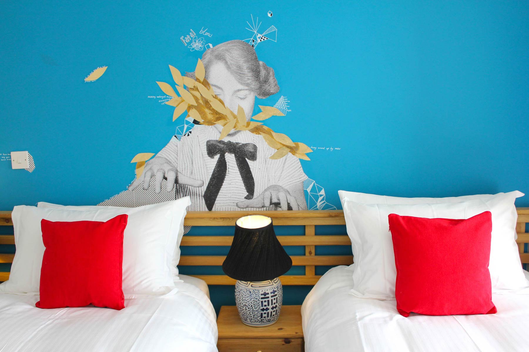 Twin room with mural