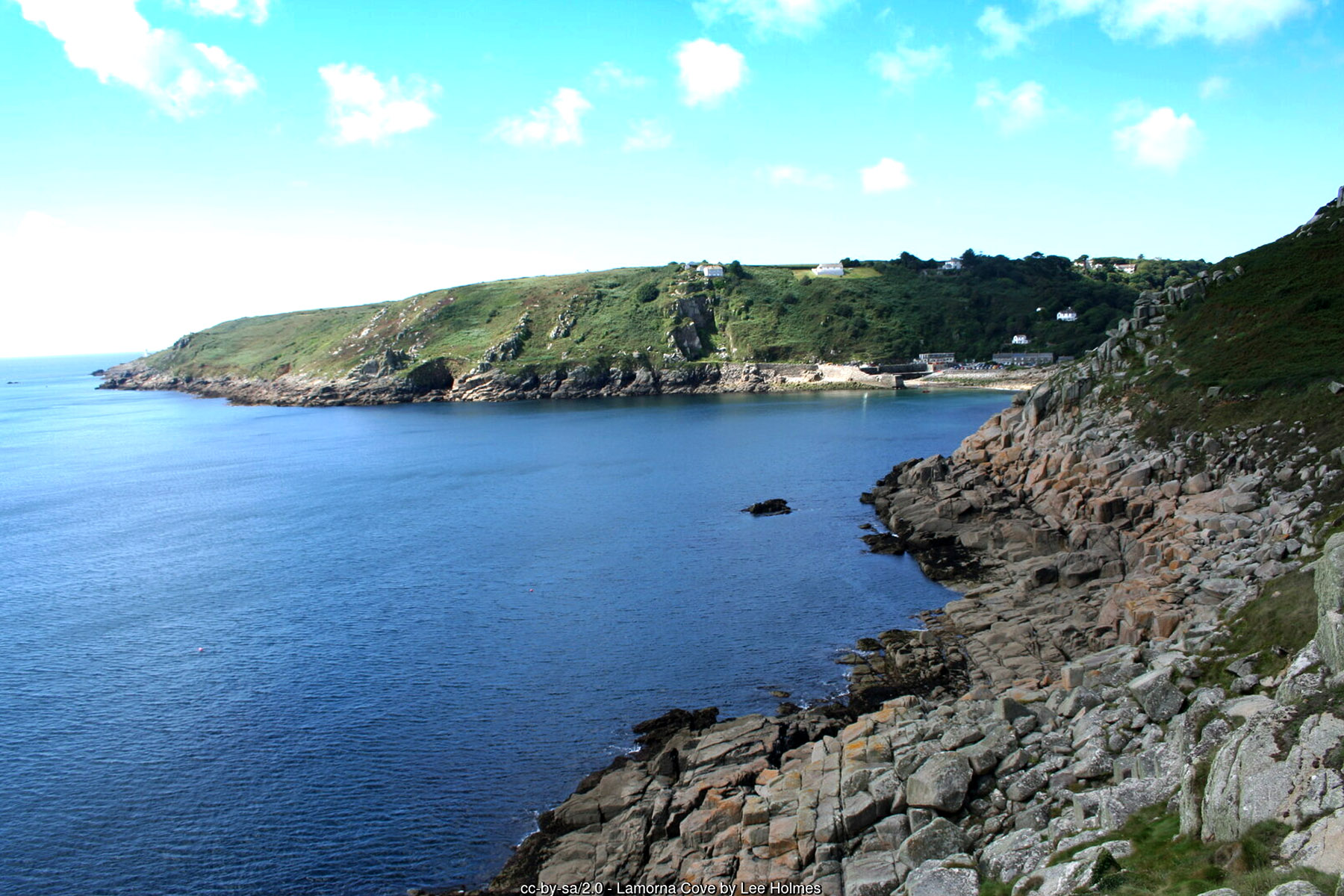 Lamorna Cove near Penzance Cornwall granite harbour and boulder cove for a coastal holiday day out