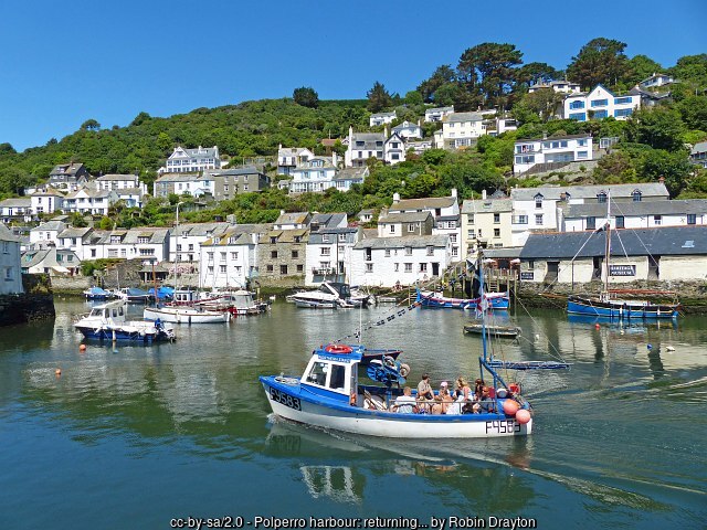 Fishing boats in Polperro's tidal harbour, Cornwall