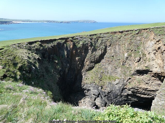 The Round Hole, a collapsed sea cave on the cliffs above Trevone Bay, Cornwall