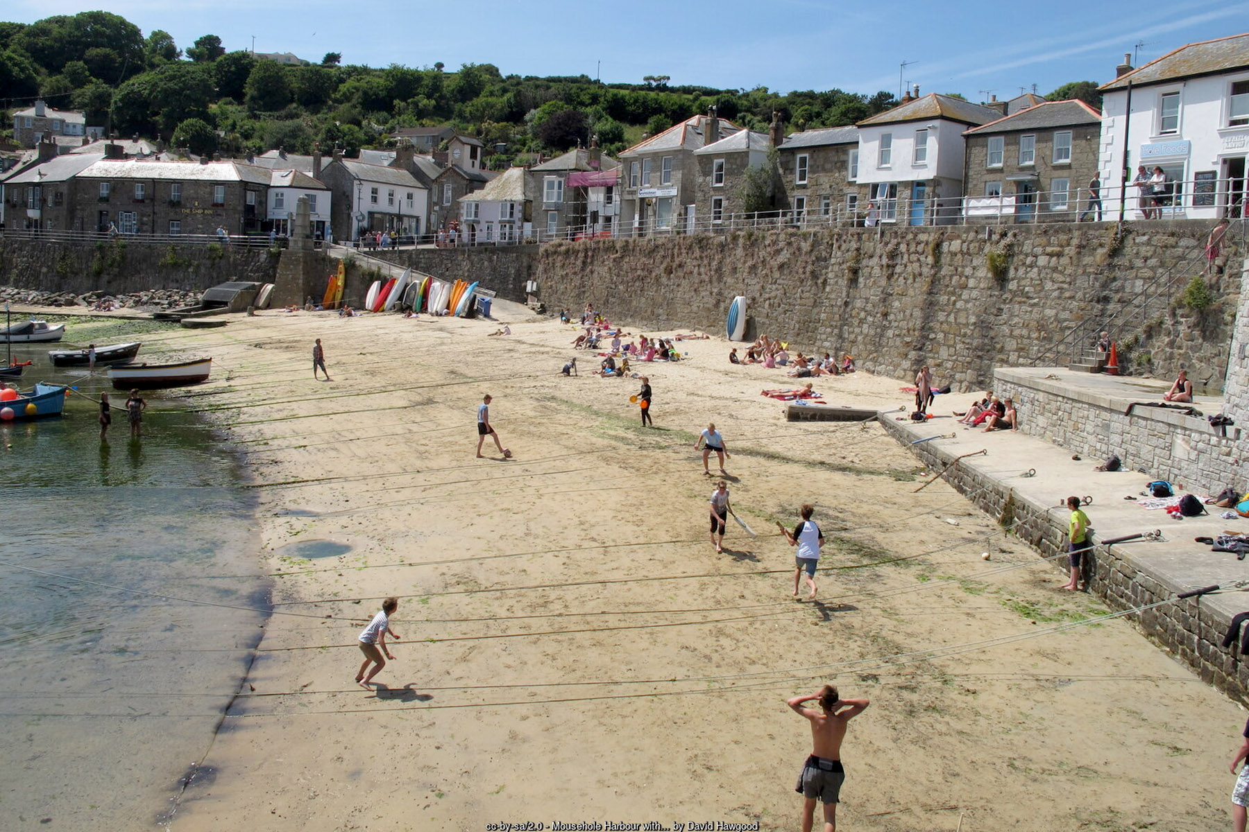 Mousehole harbour beach Cornwall picturesque fishing village - Cornwall coastal holidays