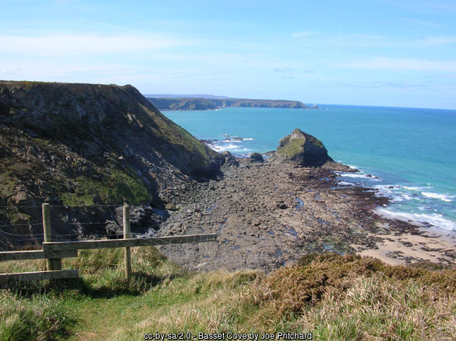 Looking across Basset's Cove from the coastal path remote beach near Portreath - Cornwall coastal walking holidays