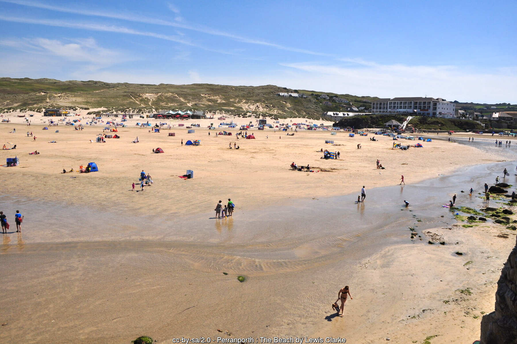 Perranporth Beach looking across the sands to the Watering Hole beach bar - Cornwall surf holidays