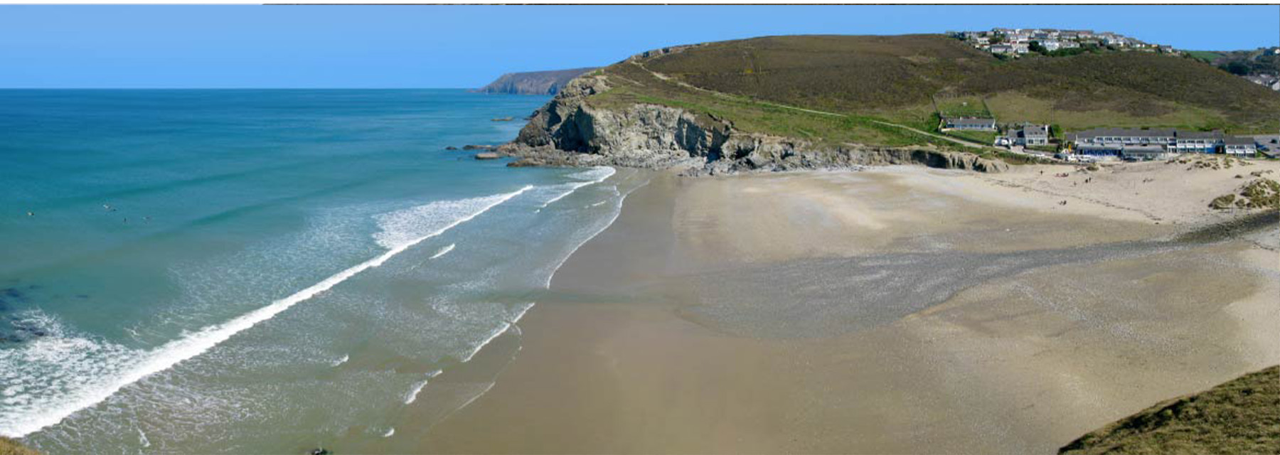 Porthtowan Beach from the South West Coastal path Cornwall Atlantic surfing waves and golden sand with dramatic slate cliffs - Cornwall surf holidays