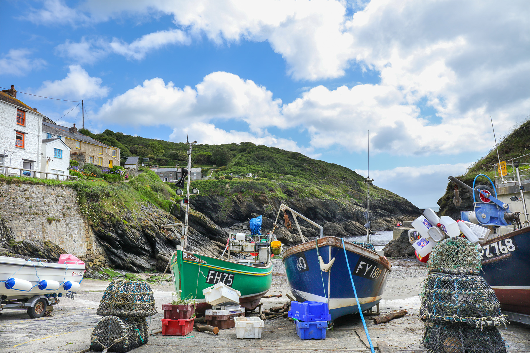 orking boats in Portloe's harbour on the Roseland Peninsula- Cornwall coastal village holidays