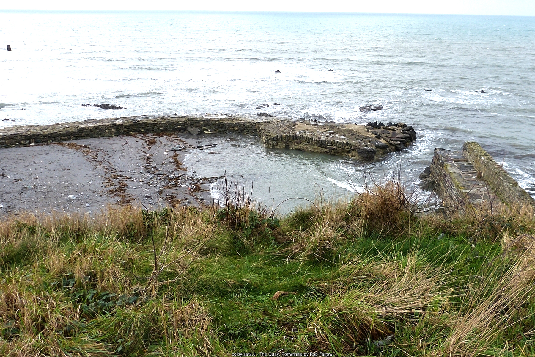 Portwrinkle beach and ruined quay at the western end of Whitsand Bay, Cornwall