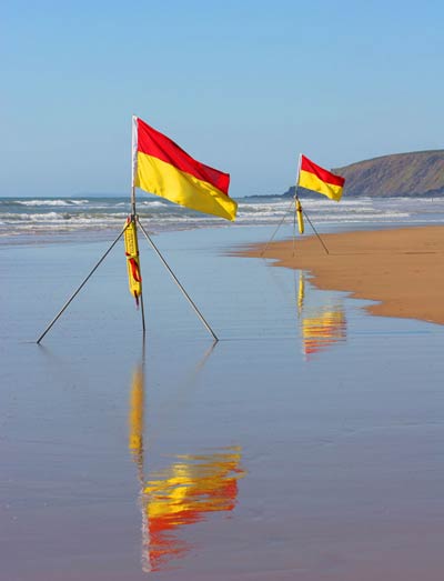 Lifeguard flags on the beach