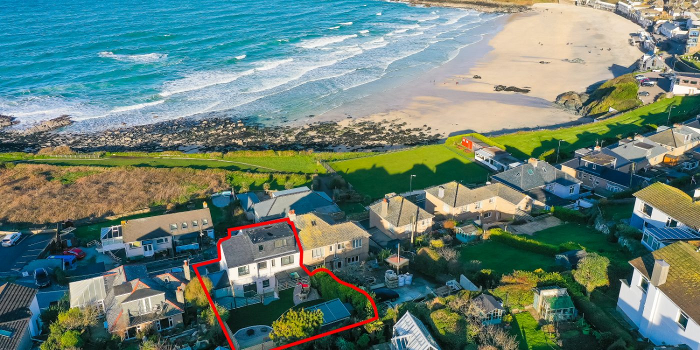 Aerial view of St Ives and Porthmeor Beach showing Tresillian