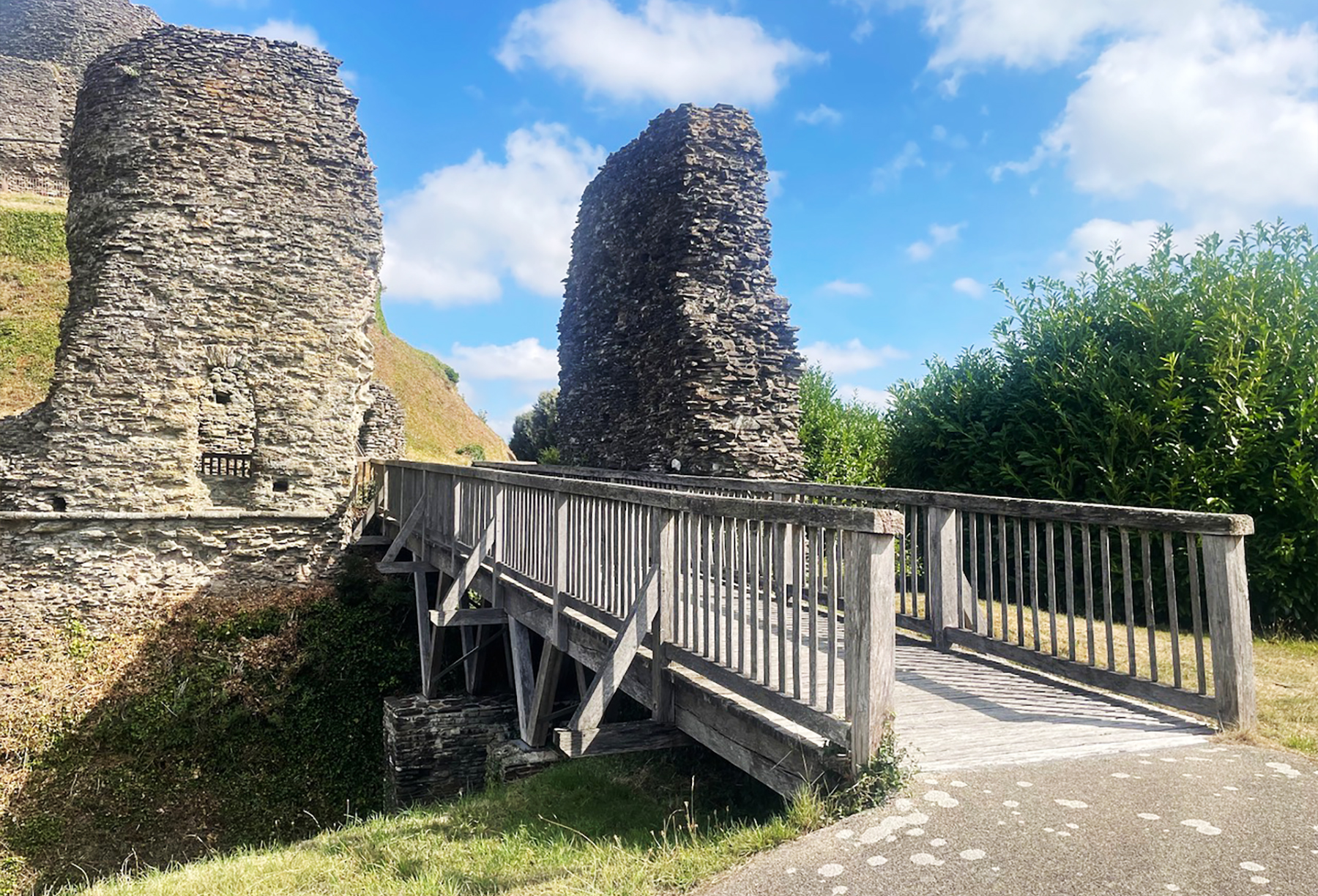 Launceston Castle Bridge across to the shell keep and tower ruins - Cornwall heritage day out