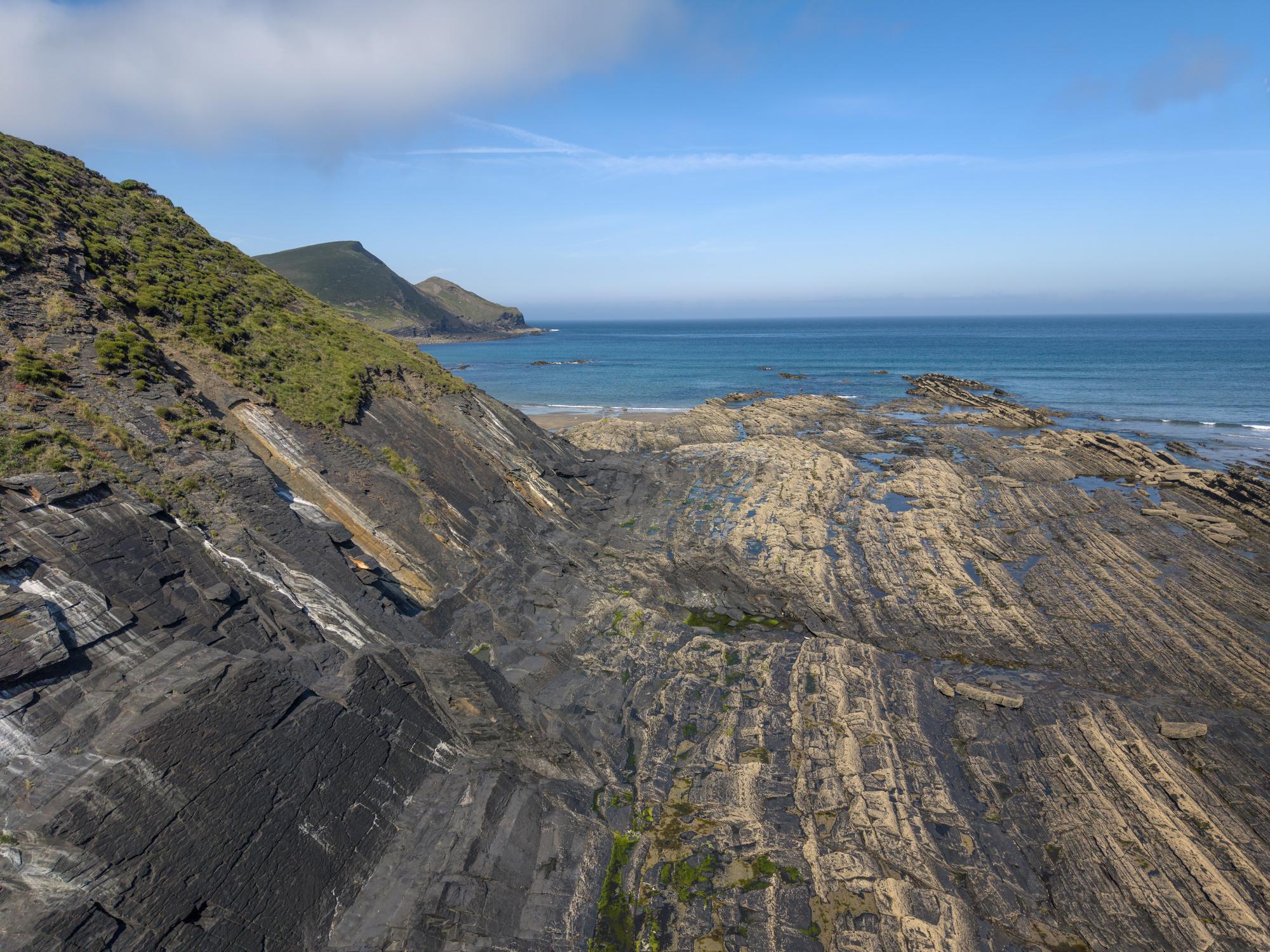 Rocky coastline and sedimentary rock exposures at Crackington Haven
