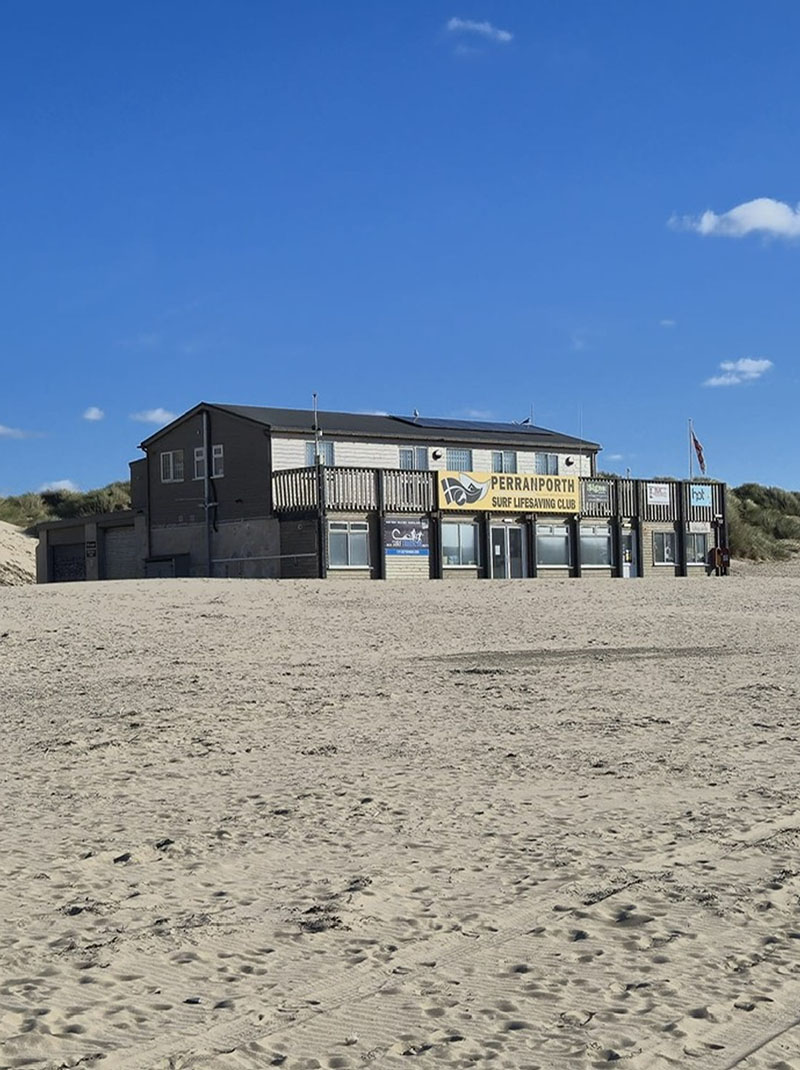 The Perranporth Surf Life Saving Club building on the sand