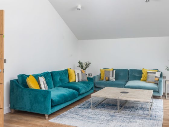 Waves lounge with teal sofas