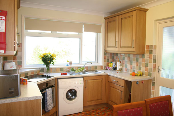 Kitchen in Langarrow Cottage at The Meadow, Holywell Bay