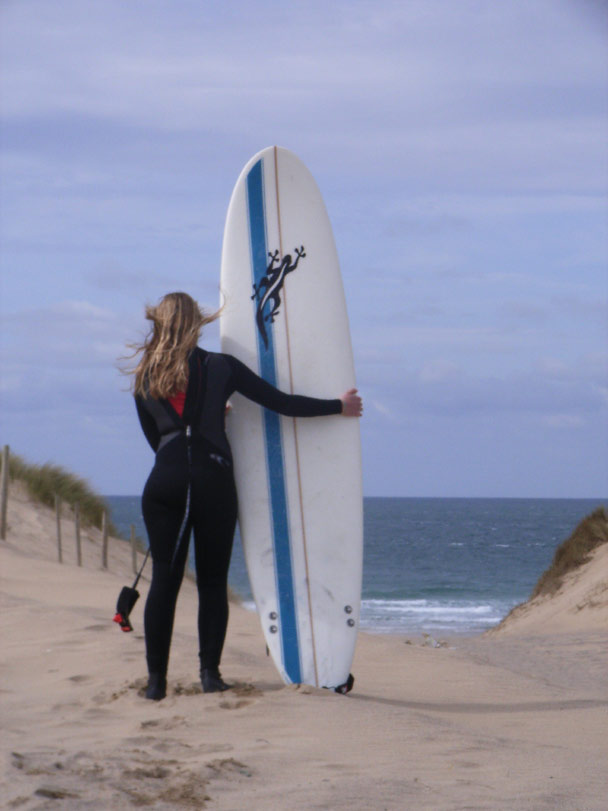 Surfing at  Holywell Bay